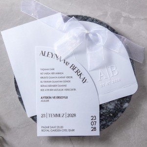 Kapağı Oval Kesim Kabartma Baskılı Fiyonklu Davetiye Modeli